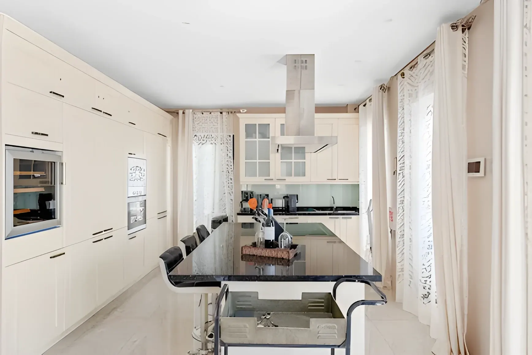 Cocina americana abierta al salón-comedor